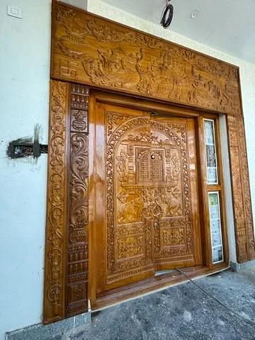 Hand-carved teak main door